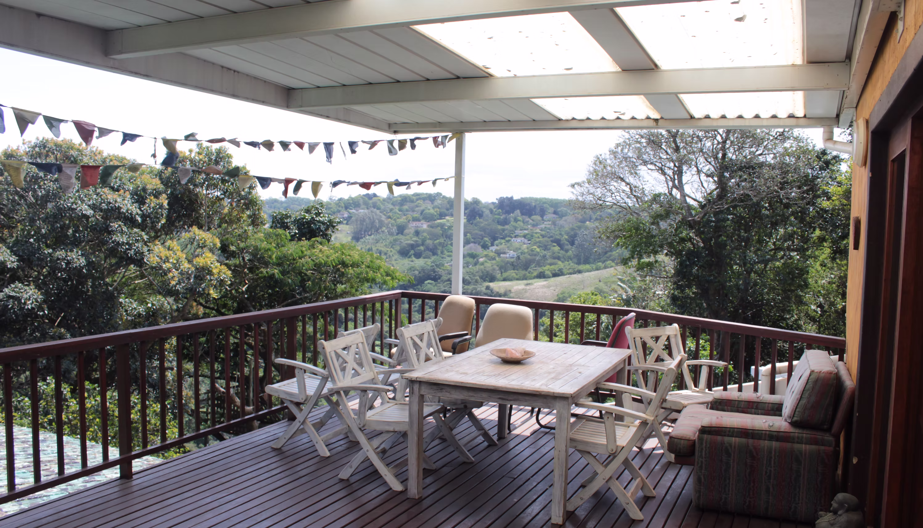 Studio balcony area with outdoor seating and mountain views - perfect for breaks and refreshments