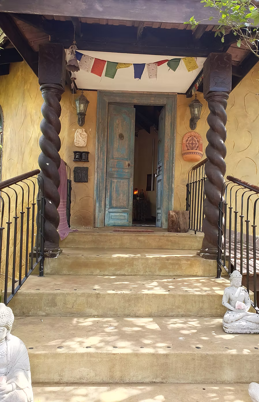 Welcoming entrance to Eagles View Yoga studio with peaceful garden setting